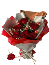 Load image into Gallery viewer, Fresh flowers with chocolate lindors
